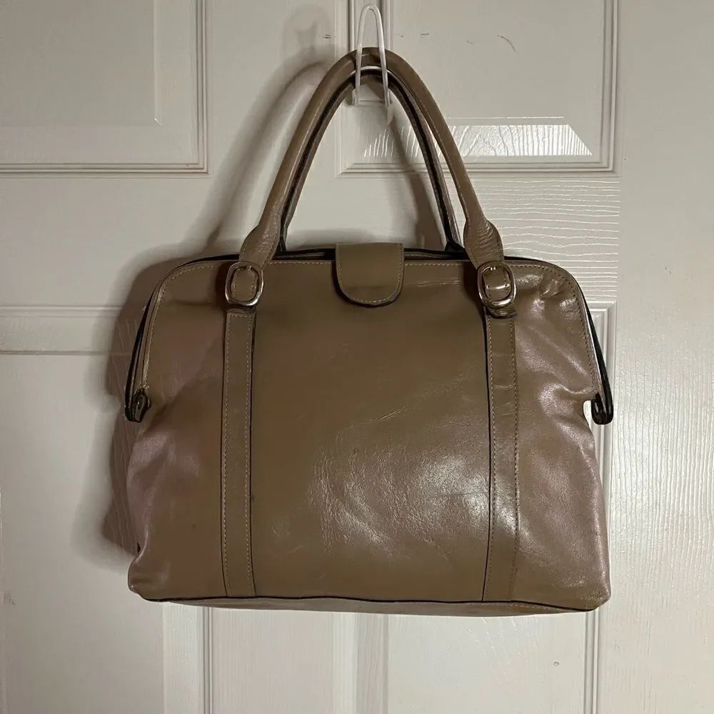 Tano Leather tan frame medium satchel gold tone hardwares .